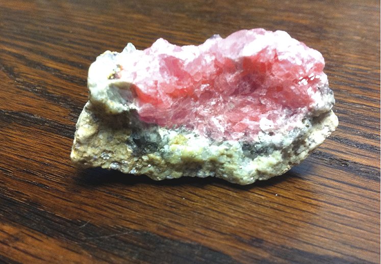 pink crystals of Rhodochrosite on a matrix of quartz